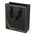 Sac cadeau 25 x 10 x 30 cm en papier cartonné noir et doré à anses ruban style élégant